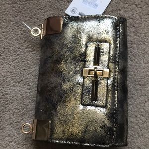 Small, elegant, black and gold formal purse.